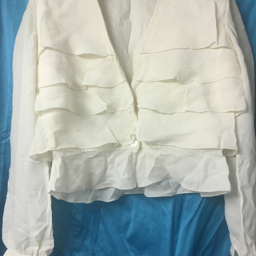 “Rare” 65% Silk “Valentino” ruffled blouse